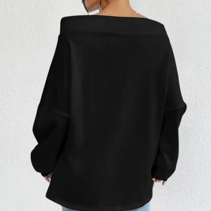 EDNA sweatshirt with frilled shoulders - a combination of comfort and modern feminine elegance!