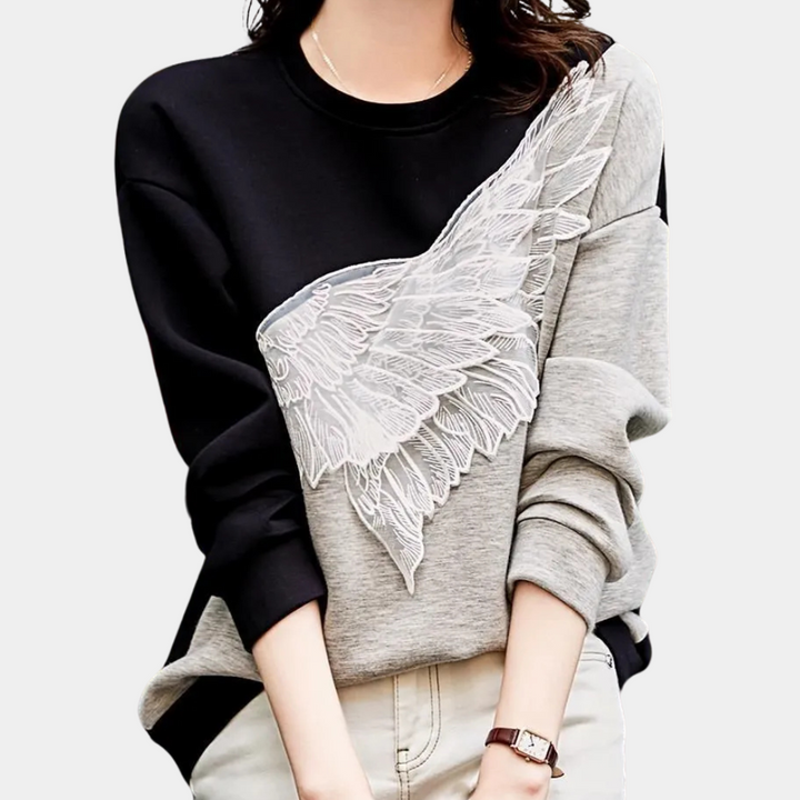 JEASELLE - Elegant women's jumper combining extreme comfort with sophisticated style