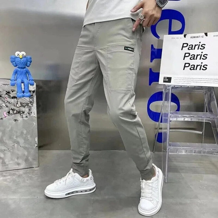 Stylish men's HARRI trousers with multiple pockets that offer the perfect combination of elegance and comfort.