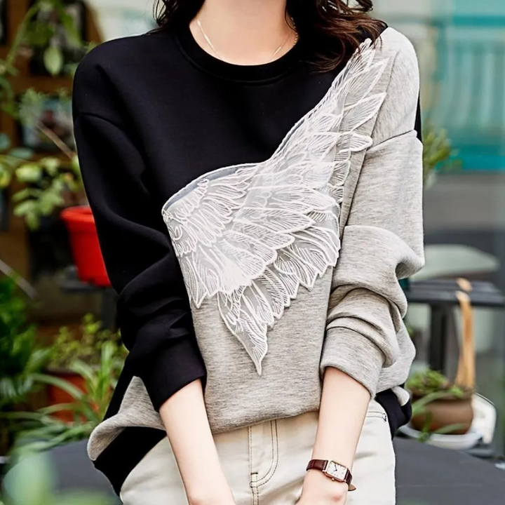 JEASELLE - Elegant women's jumper combining extreme comfort with sophisticated style