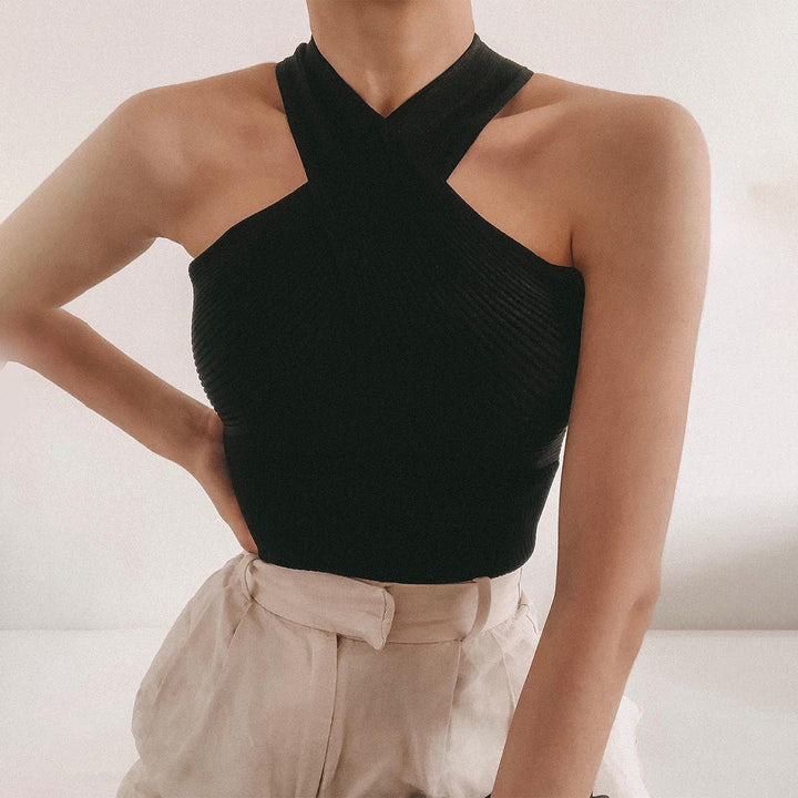 Stylish WAVERLY top with subtle criss-crossing straps for an elegant chic look