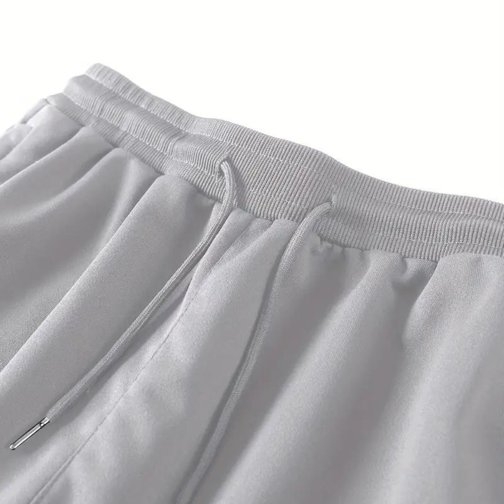 EETU - Classic, elegant running trousers with adjustable hem