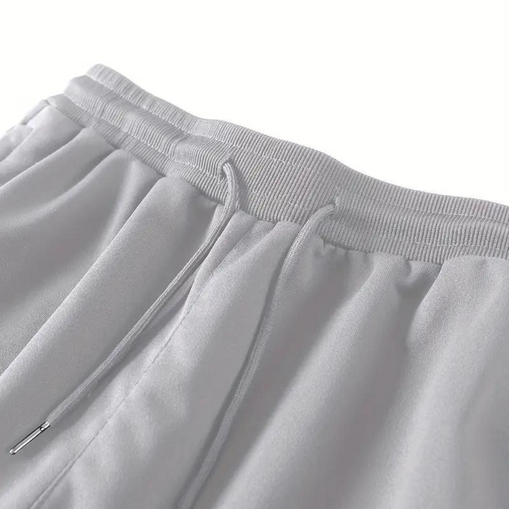 EETU - Classic, elegant running trousers with adjustable hem