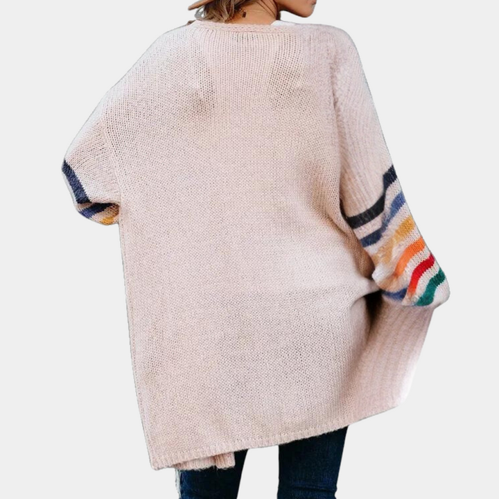 Stylish women's cardigan with striking glittery rainbow print