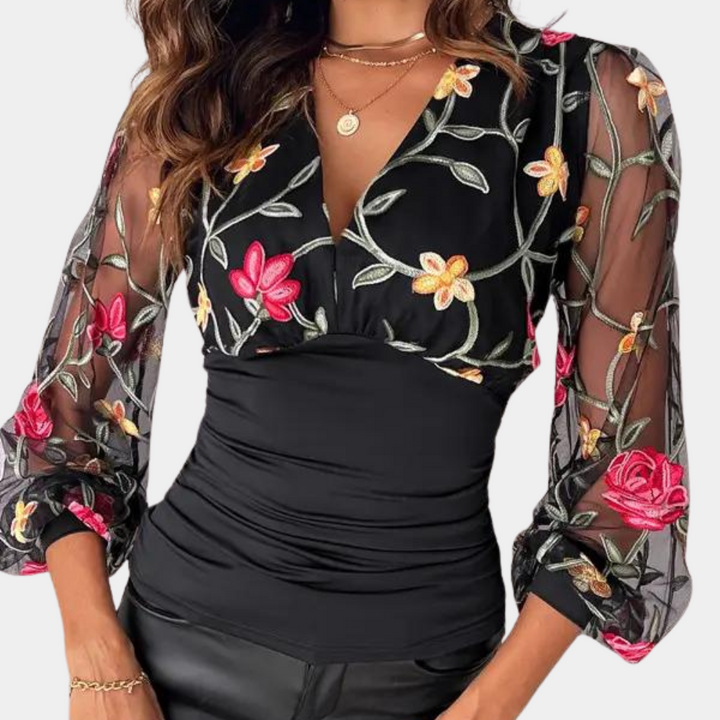 Stylish women's blouse with subtle floral embroidery