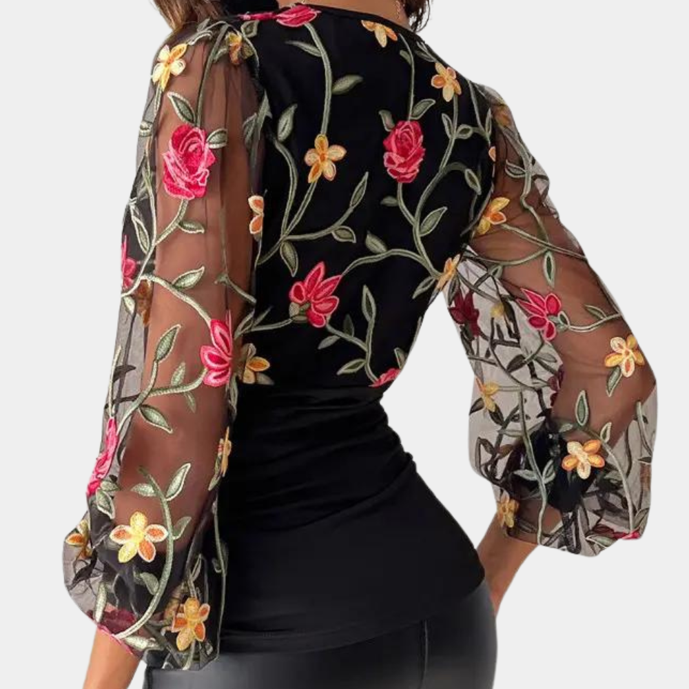 Stylish women's blouse with subtle floral embroidery
