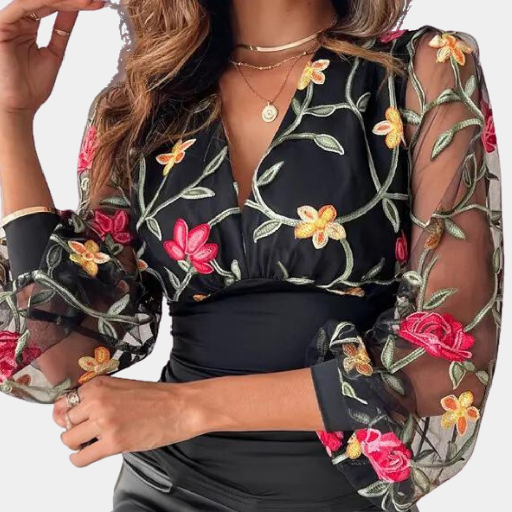 Stylish women's blouse with subtle floral embroidery