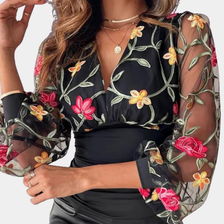 Stylish women's blouse with subtle floral embroidery