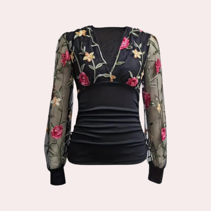 Stylish women's blouse with subtle floral embroidery