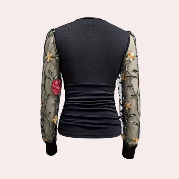 Stylish women's blouse with subtle floral embroidery