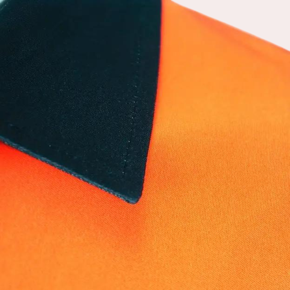 A fashionable men's shirt in a fresh orange colour - the perfect choice for any occasion!