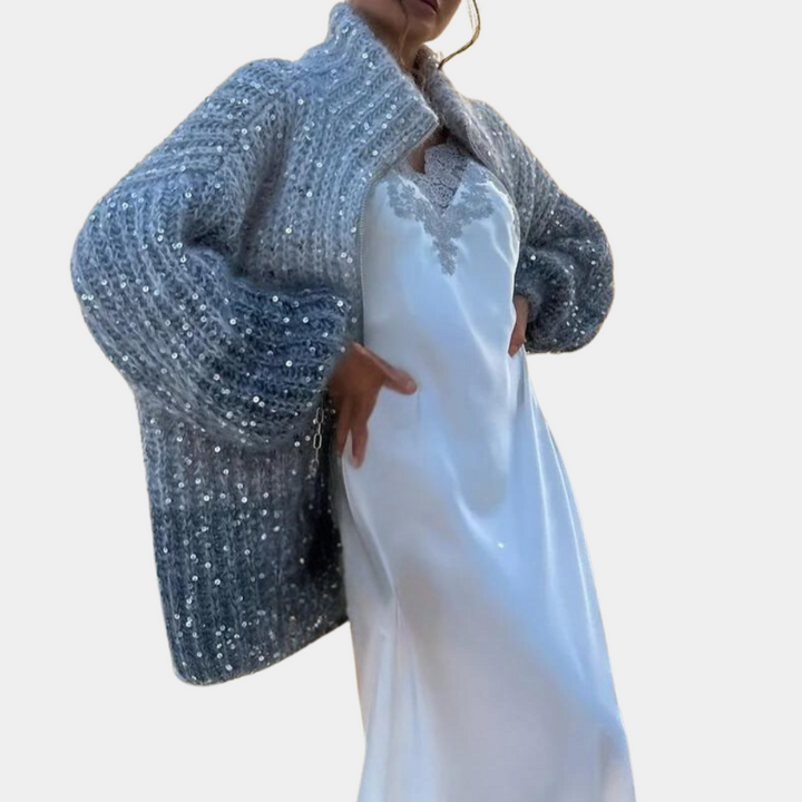 Elegant women's jumper with striking sequins