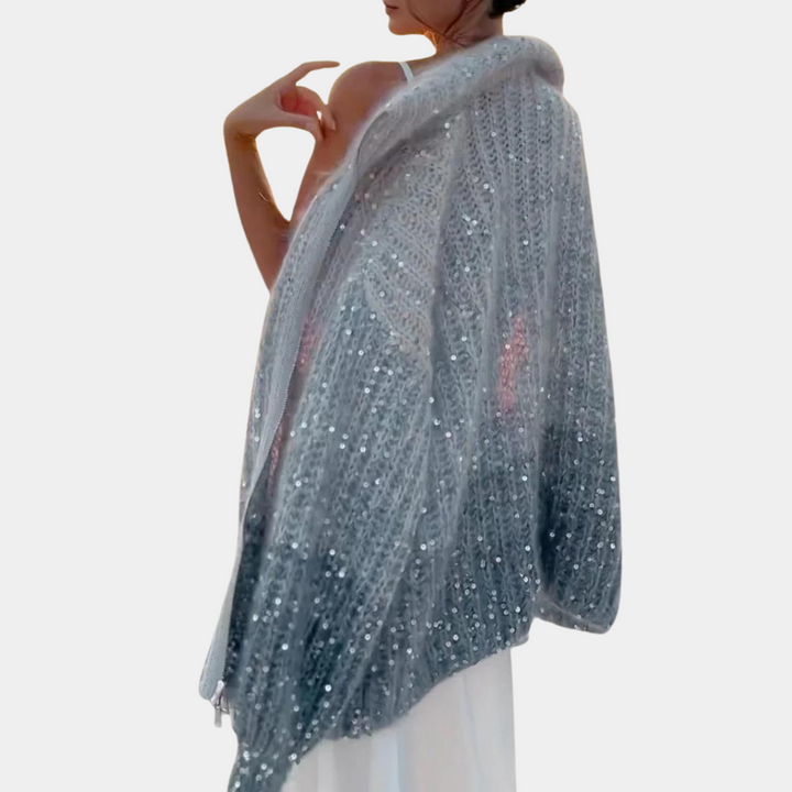 Elegant women's jumper with striking sequins