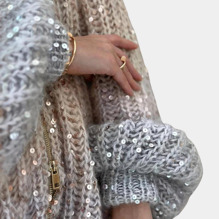 Elegant women's jumper with striking sequins