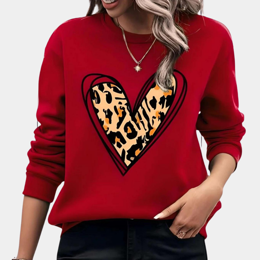 Stylish women's jumper with charming heart motif