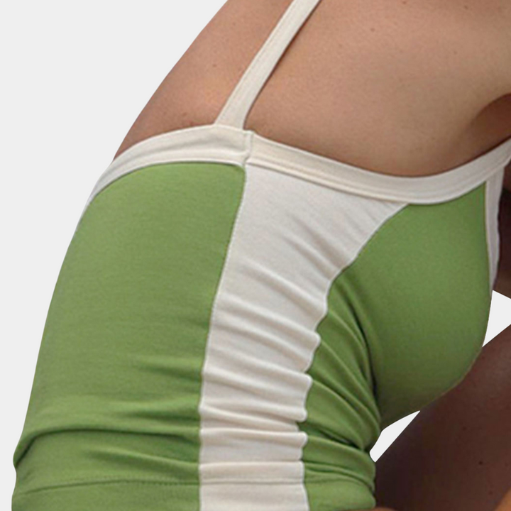 A stylish women's top with thin straps that will add a chic and elegant touch to any outfit