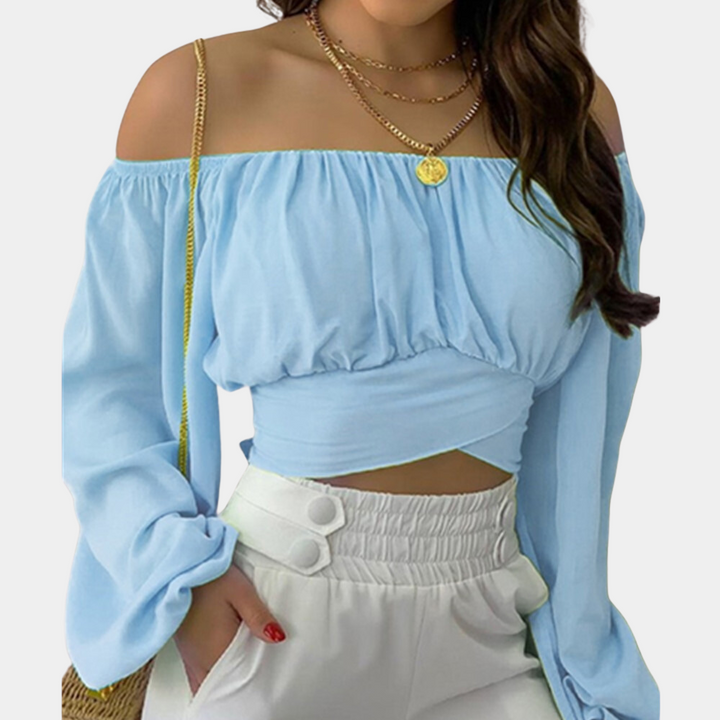 Stylish women's strapless blouse with striking long sleeves