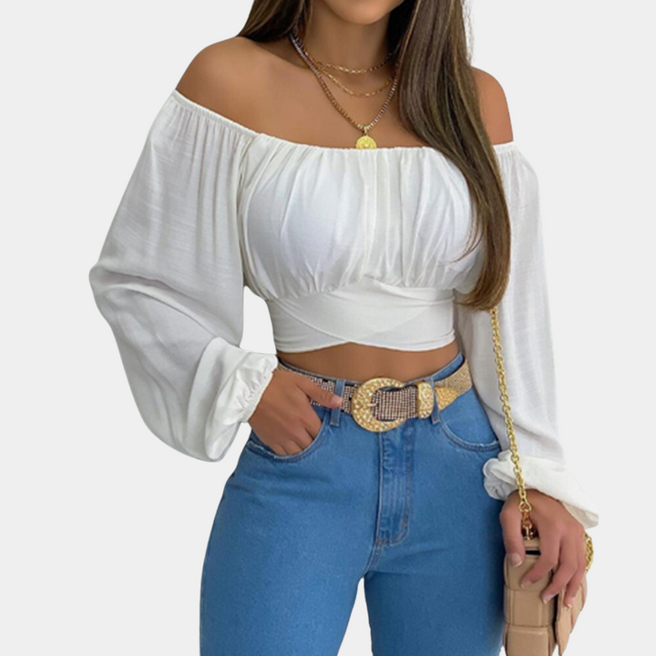 Stylish women's strapless blouse with striking long sleeves