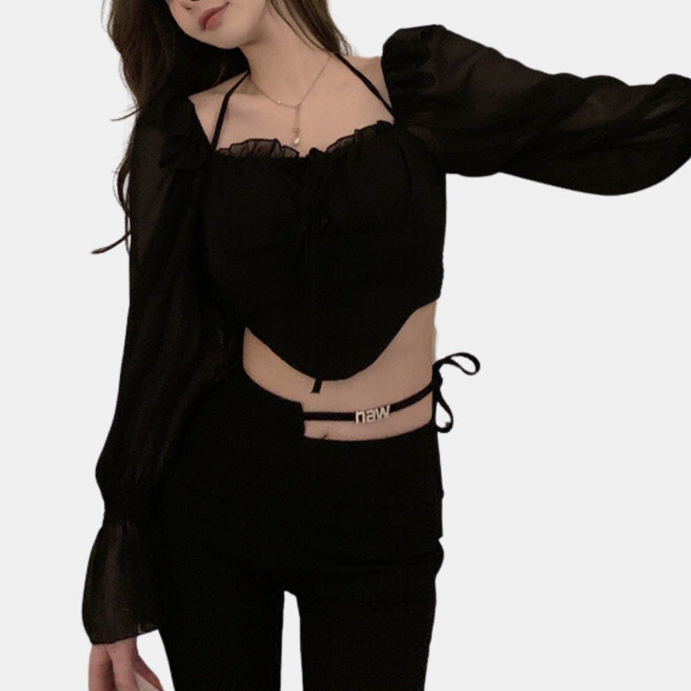 Elegant women's top with fashionable open shoulders