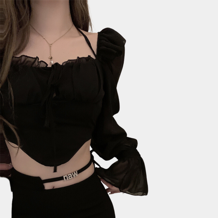 Elegant women's top with fashionable open shoulders