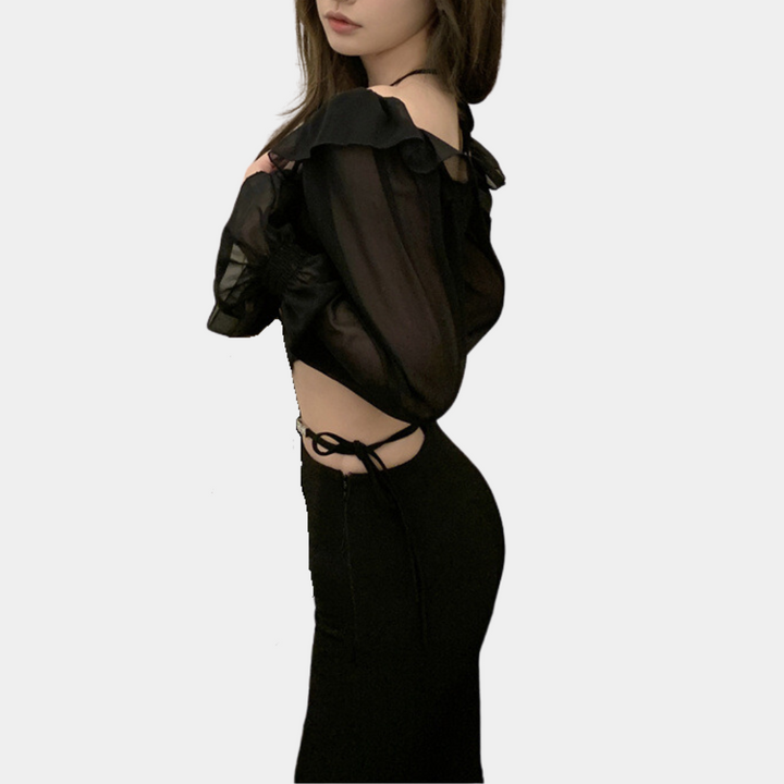 Elegant women's top with fashionable open shoulders