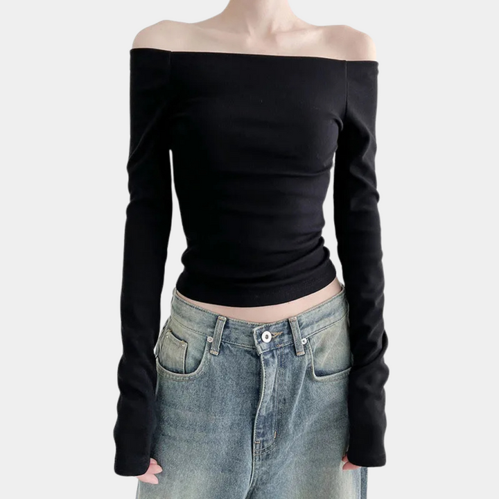Stylish women's summer blouse with long sleeves and striking open shoulders