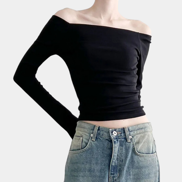 Stylish women's summer blouse with long sleeves and striking open shoulders