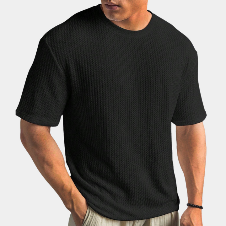 A stylish and comfortable men's shirt, perfect for moments of relaxation.
