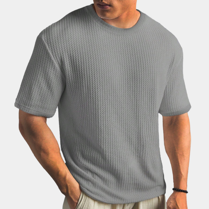 A stylish and comfortable men's shirt, perfect for moments of relaxation.