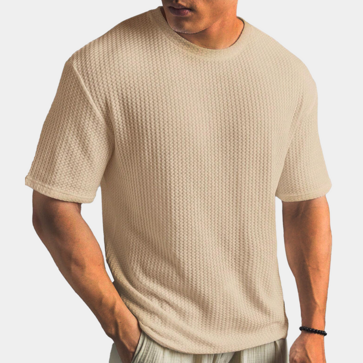 A stylish and comfortable men's shirt, perfect for moments of relaxation.
