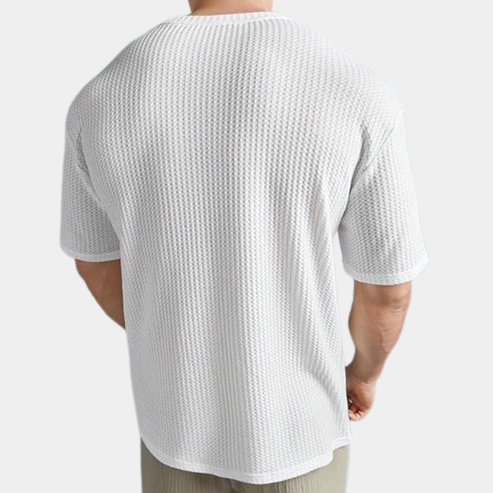 A stylish and comfortable men's shirt, perfect for moments of relaxation.