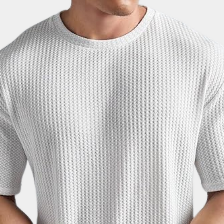 A stylish and comfortable men's shirt, perfect for moments of relaxation.