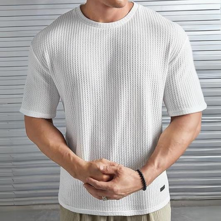 A stylish and comfortable men's shirt, perfect for moments of relaxation.