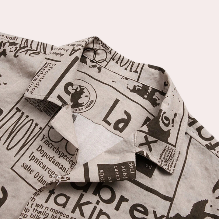 Stylish men's Bartosz T-shirt with unique newspaper-inspired print