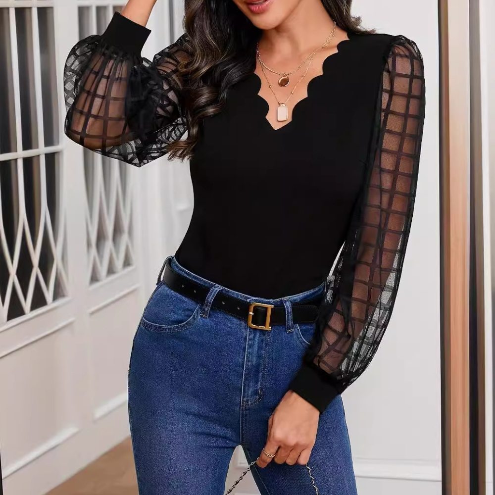 Ronja - Stylish top with pointed neckline and unique ruffled accents