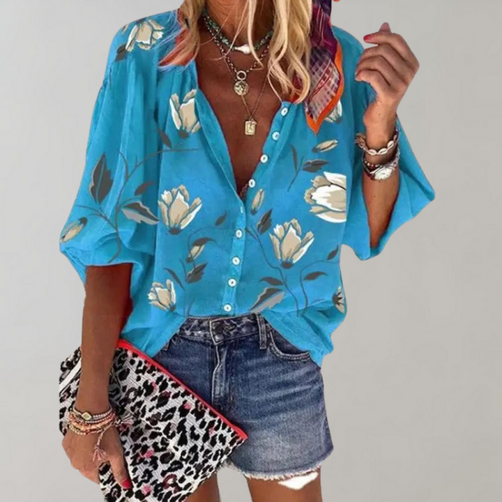 Elegant women's Freydis blouse with a charming floral motif