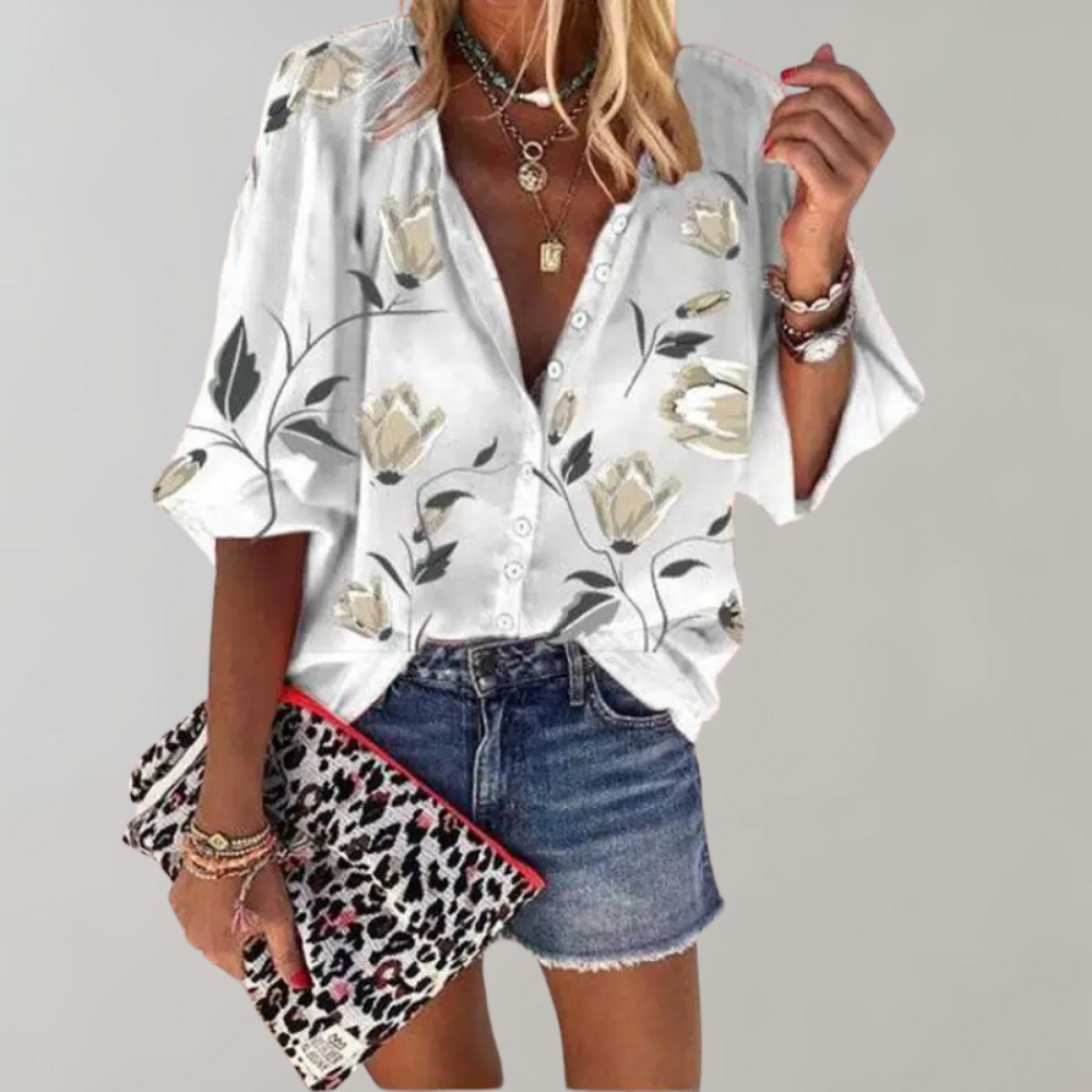 Elegant women's Freydis blouse with a charming floral motif