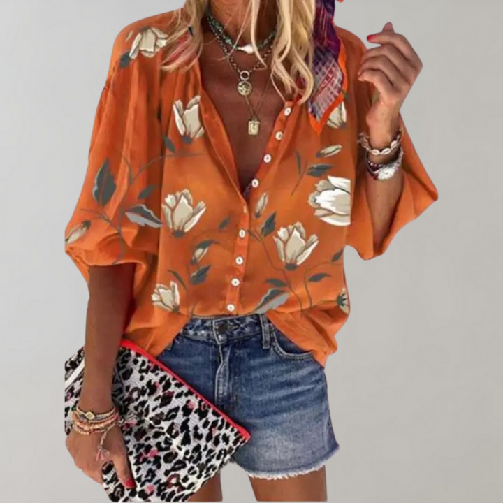 Elegant women's Freydis blouse with a charming floral motif