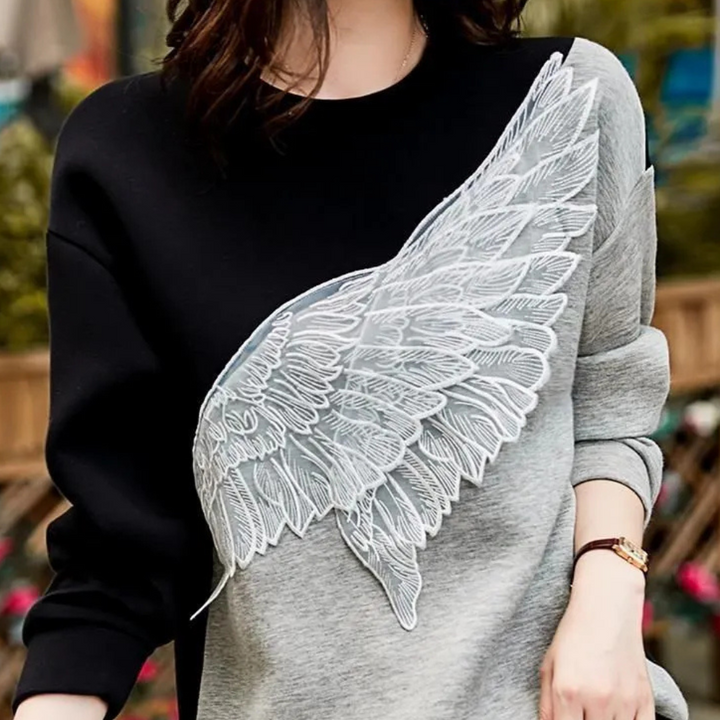 JEASELLE - Elegant women's jumper combining extreme comfort with sophisticated style