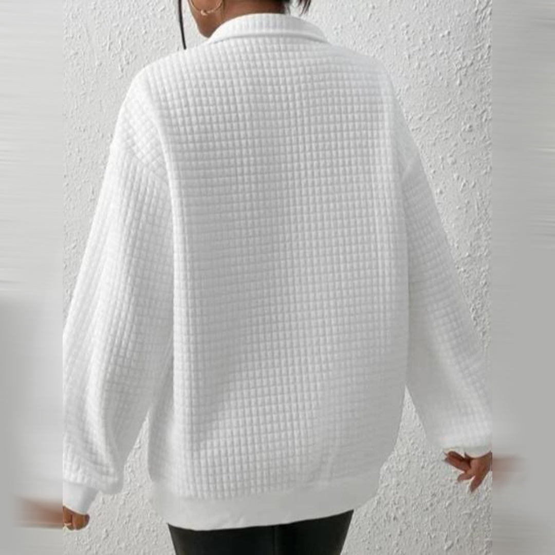 A stylish zip-up sweatshirt that adds elegance to any outfit